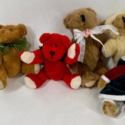 Sale Photo Thumbnail #130: 9 bears. Various colors and costumes, some are dressed like Santa.  All in good condition.