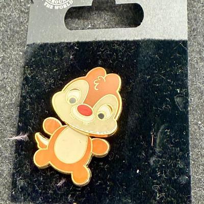 Sale Photo Thumbnail #196: Disney pin featuring the character Dale from the Chip 'n' Dale franchise. The pin is a bobble-head