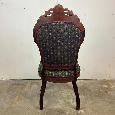 Sale Photo Thumbnail #1822: Very good condition 
upholstery is clean and free of spots or stains 
carving is in good condition 
measures 40.5" high x 19" wide x 18" deep x 18" seat height 
front less have castors