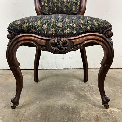 Sale Photo Thumbnail #1820: Very good condition 
upholstery is clean and free of spots or stains 
carving is in good condition 
measures 40.5" high x 19" wide x 18" deep x 18" seat height 
front less have castors