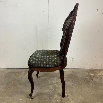 Sale Photo Thumbnail #1821: Very good condition 
upholstery is clean and free of spots or stains 
carving is in good condition 
measures 40.5" high x 19" wide x 18" deep x 18" seat height 
front less have castors