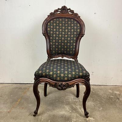 Sale Photo Thumbnail #1817: Very good condition 
upholstery is clean and free of spots or stains 
carving is in good condition 
measures 40.5" high x 19" wide x 18" deep x 18" seat height 
front less have castors