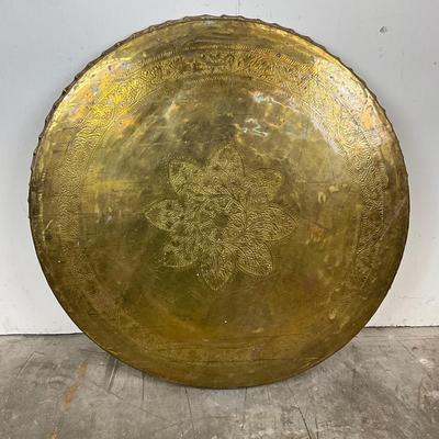 Sale Photo Thumbnail #1825: scalloped edge with floral medallion 
very good conditiion measuring 40" diameter 
x 1.5" high