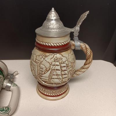2 HAND PAINTED BEER STEINS BY AVON