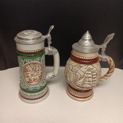 2 HAND PAINTED BEER STEINS BY AVON