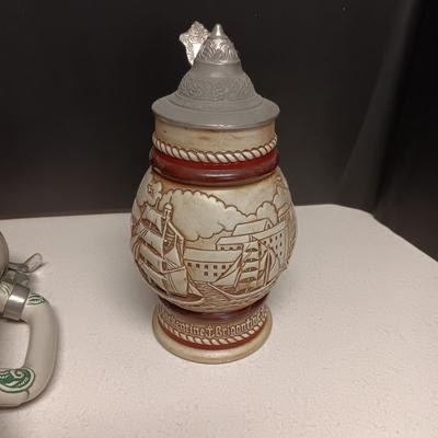 2 HAND PAINTED BEER STEINS BY AVON