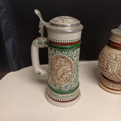 2 HAND PAINTED BEER STEINS BY AVON