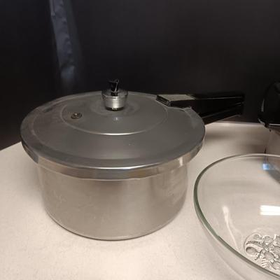 SMALLER CROCK POT, PRESSURE COOKER AND A SERVING BOWL