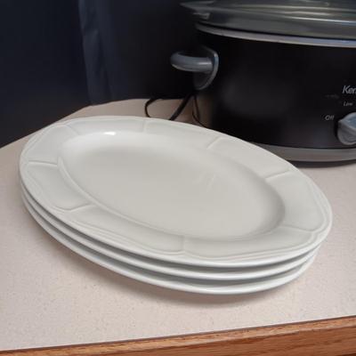 LARGE CROCK POT, 2 SERVING BOWLS AND 3 SERVING PLATTERS