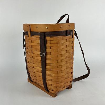 Sale Photo Thumbnail #1846: nylon straps with copper hardware made of woven splints 
16" high x 13" wide x 11" deep