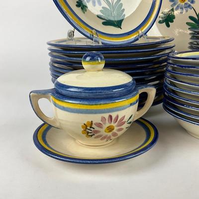 Sale Photo Thumbnail #1872: One large charger 14.5" diameter, 12 salad plates 9" diameter, 1 covered sugar dish, 9 small bowls 5.5" diameter , 14 bread and butter plates, 13 saucers, 11 teacups 
all in good condition