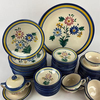 Sale Photo Thumbnail #1871: One large charger 14.5" diameter, 12 salad plates 9" diameter, 1 covered sugar dish, 9 small bowls 5.5" diameter , 14 bread and butter plates, 13 saucers, 11 teacups 
all in good condition