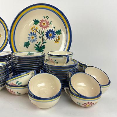 Sale Photo Thumbnail #1870: One large charger 14.5" diameter, 12 salad plates 9" diameter, 1 covered sugar dish, 9 small bowls 5.5" diameter , 14 bread and butter plates, 13 saucers, 11 teacups 
all in good condition