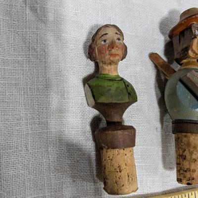Collection of 5 Anri Hand Carved Bottle Stoppers