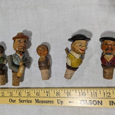 Collection of 5 Anri Hand Carved Bottle Stoppers
