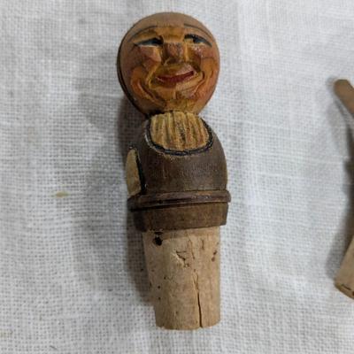 Collection of 5 Anri Hand Carved Bottle Stoppers