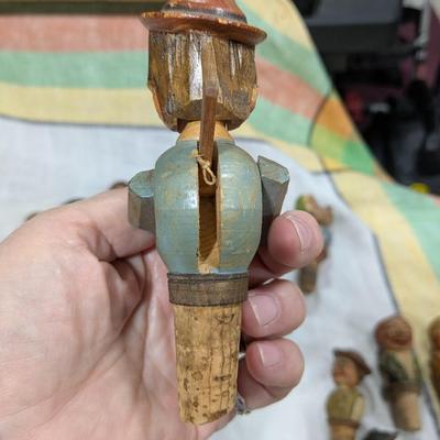 Collection of 5 Anri Hand Carved Bottle Stoppers