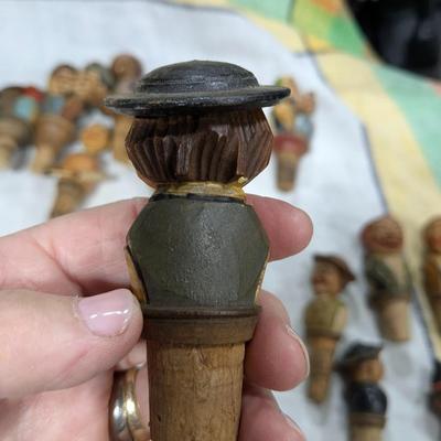 Collection of 5 Anri Hand Carved Bottle Stoppers
