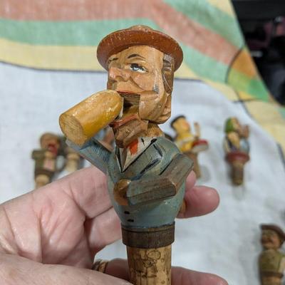 Collection of 5 Anri Hand Carved Bottle Stoppers