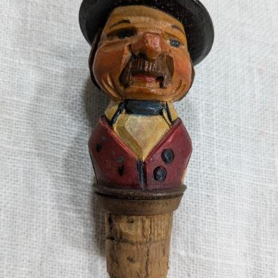 Collection of 5 Anri Hand Carved Bottle Stoppers