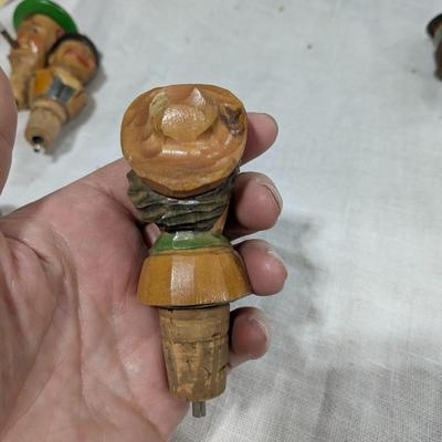 Collection of 5 ANRI Hand Carved Bottle Stoppers