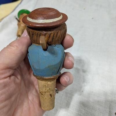 Collection of 5 ANRI Hand Carved Bottle Stoppers