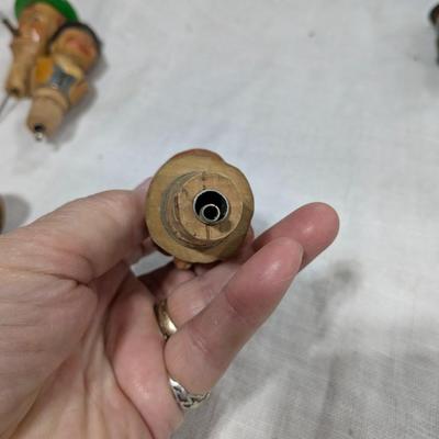 Collection of 5 ANRI Hand Carved Bottle Stoppers
