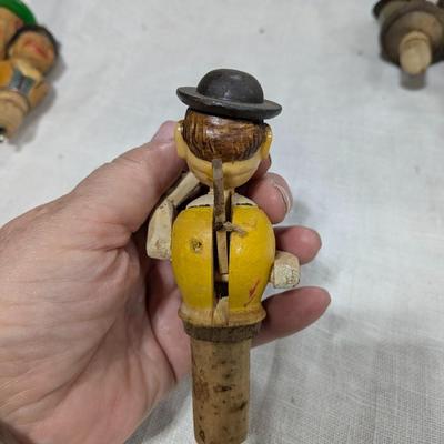 Collection of 5 ANRI Hand Carved Bottle Stoppers