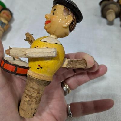 Collection of 5 ANRI Hand Carved Bottle Stoppers