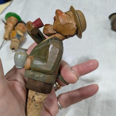 Collection of 5 ANRI Hand Carved Bottle Stoppers
