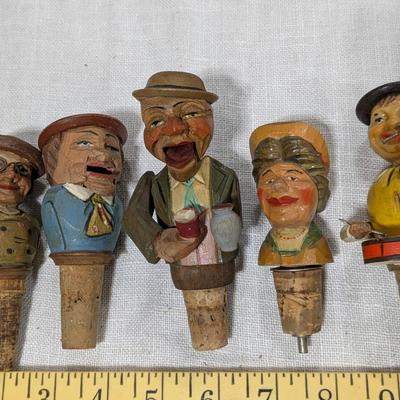 Collection of 5 ANRI Hand Carved Bottle Stoppers