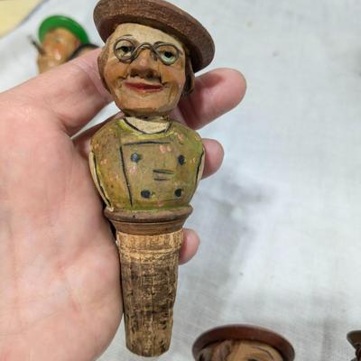 Collection of 5 ANRI Hand Carved Bottle Stoppers