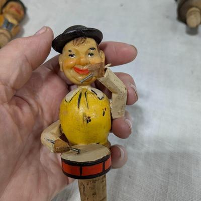 Collection of 5 ANRI Hand Carved Bottle Stoppers