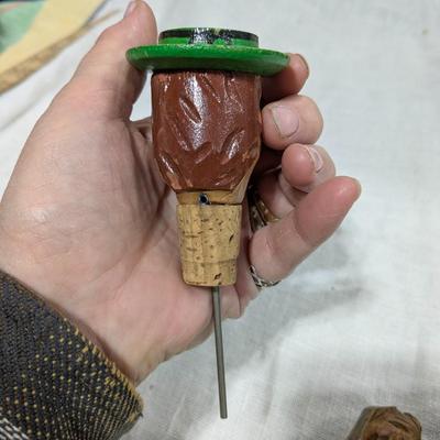 Collection of 4 ANRI Hand Carved Bottle Stoppers