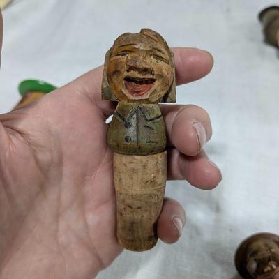 Collection of 4 ANRI Hand Carved Bottle Stoppers