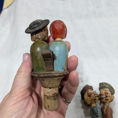 Collection of 5 ANRI Hand Carved Bottle Stoppers