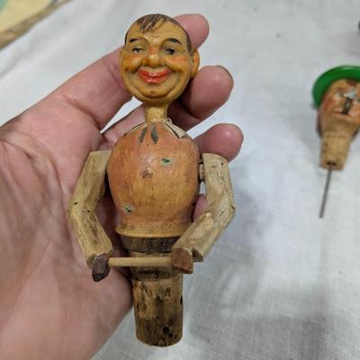 Collection of 5 ANRI Hand Carved Bottle Stoppers