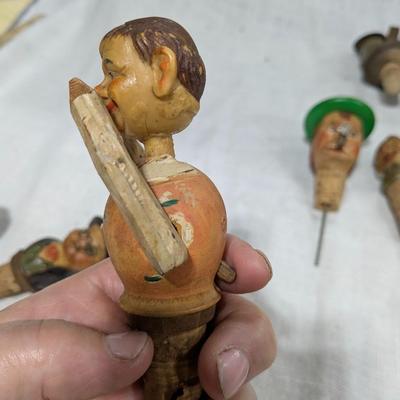 Collection of 5 ANRI Hand Carved Bottle Stoppers