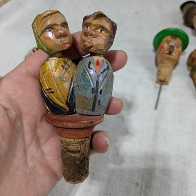 Collection of 5 ANRI Hand Carved Bottle Stoppers