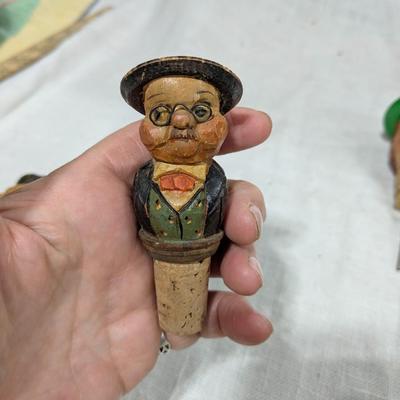 Collection of 5 ANRI Hand Carved Bottle Stoppers