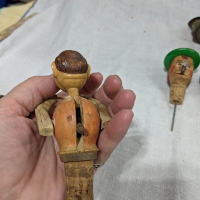 Collection of 5 ANRI Hand Carved Bottle Stoppers