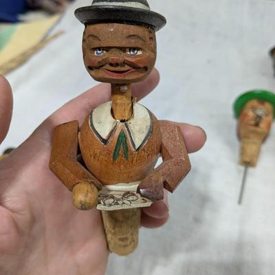 Collection of 5 ANRI Hand Carved Bottle Stoppers
