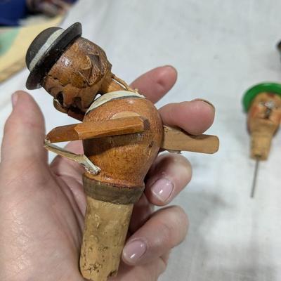 Collection of 5 ANRI Hand Carved Bottle Stoppers