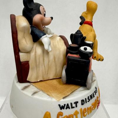 Sale Photo Thumbnail #166: Ceramic figurine of Mickey and Pluto, with Pluto acting as Mickey's butler.  Recreates a scene from a 1941 cartoon.  Very good condition.