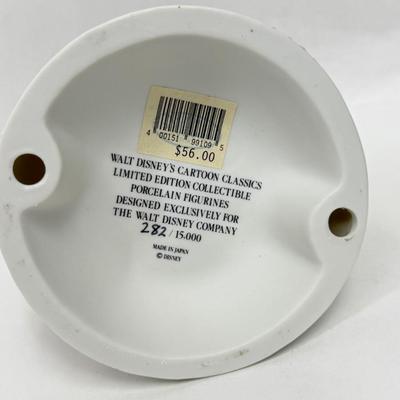 Sale Photo Thumbnail #161: Ceramic figurine of Mickey and Pluto, with Pluto acting as Mickey's butler.  Recreates a scene from a 1941 cartoon.  Very good condition.