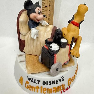 Sale Photo Thumbnail #159: Ceramic figurine of Mickey and Pluto, with Pluto acting as Mickey's butler.  Recreates a scene from a 1941 cartoon.  Very good condition.