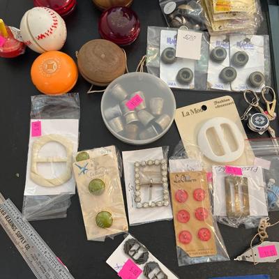 Sale Photo Thumbnail #12: Ford Glass checker board,YoYo’s , thimbles, buttons and more.
