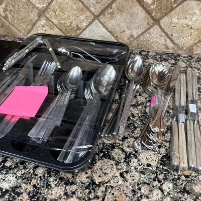 Sale Photo Thumbnail #110: Stanley Robert’s Silverware set and Spices
