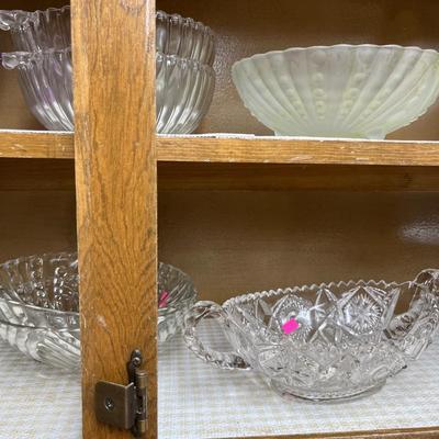 Sale Photo Thumbnail #139: Vintage Glassware 
Bowls, Candlesticks, Pitcher, and more.