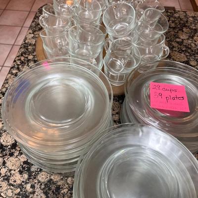 Sale Photo Thumbnail #161: 29 Cups & 39 Plates Clear glass and plates.